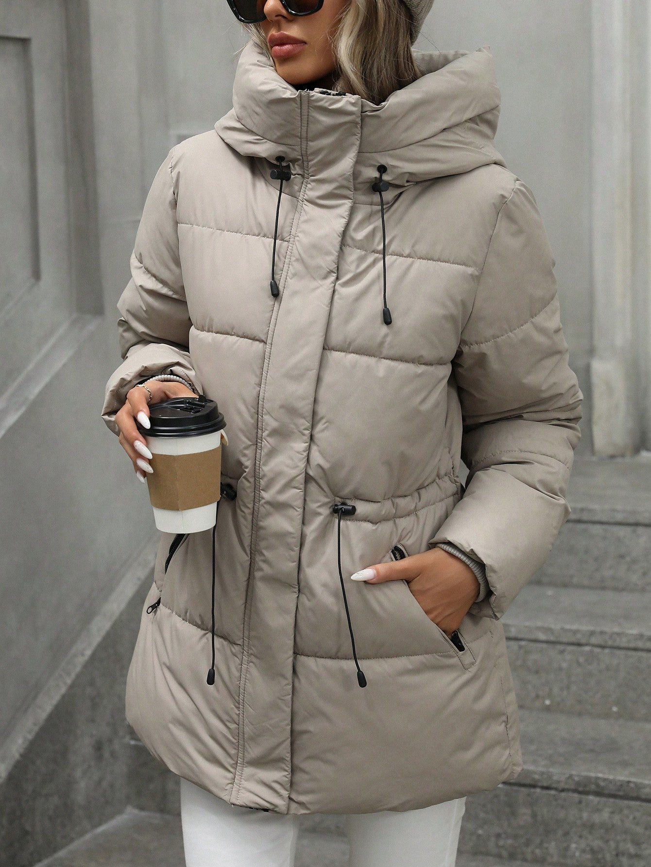 “Collar shot: plush hood designed to shield you from gusts, with a light, breathable feel.”