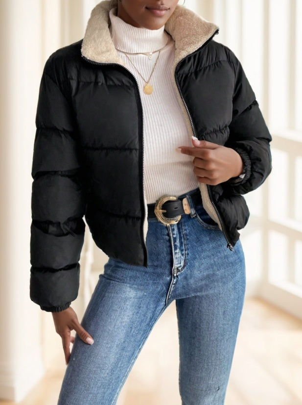 Reversible jacket flipped to beige side, ideal for layering