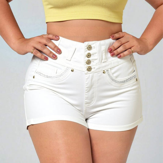 Model styling slim fit white shorts with crop top and heels for club look