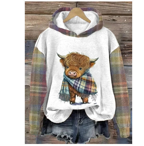Woman wearing 3D cat hoodie styled with denim and sneakers