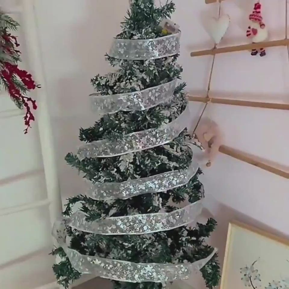 Window frame lined with fairy lights ribbon – warm indoor shine