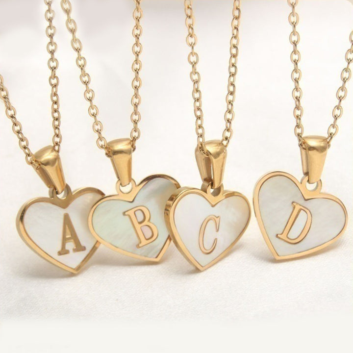 Personalized letter pendant necklace with heart design, stainless steel construction and 45+5 cm chain - For online shopping.