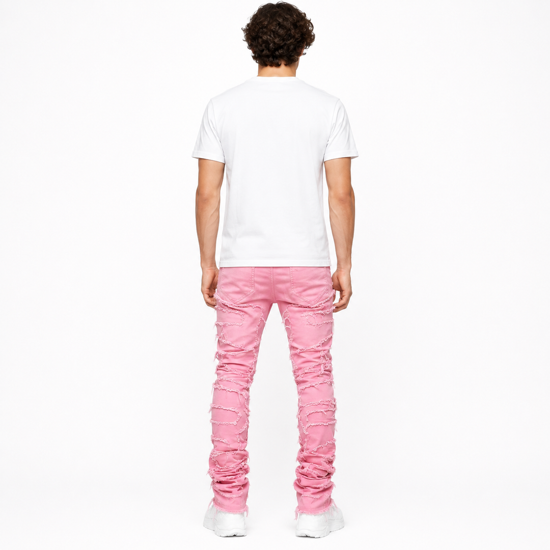 Person wearing a white t-shirt and pink jeans on a white background