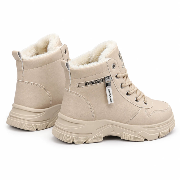 Rear three-quarter view of Khaki ankle boots showing heel stitching and pull loops