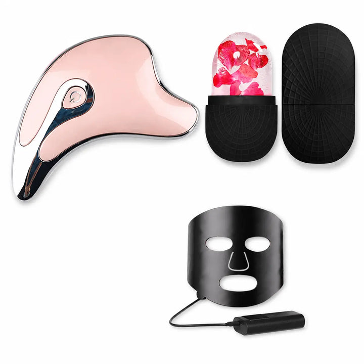 Pink Set displayed on a white background with a pink massage tool, cooling accessory, storage case, face mask and controller.