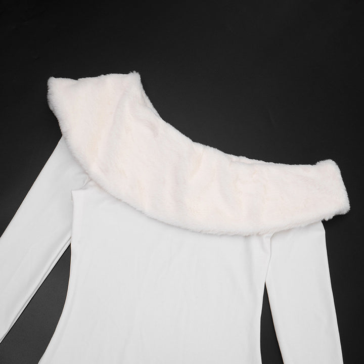White maxi dress front view highlighting the oblique collar, long sleeves and patchwork construction in clean studio setting.