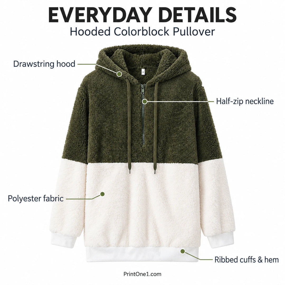 Hooded colorblock pullover details: drawstring hood, half zip, polyester fabric and ribbed cuffs