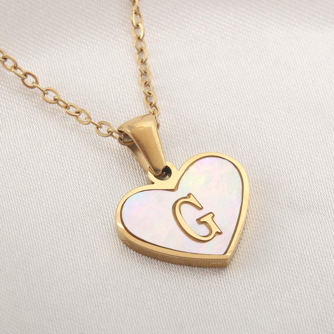 Stainless steel letter necklace with heart-shaped pendant, gold-plated finish and alphabet initial choices - Online shopping.