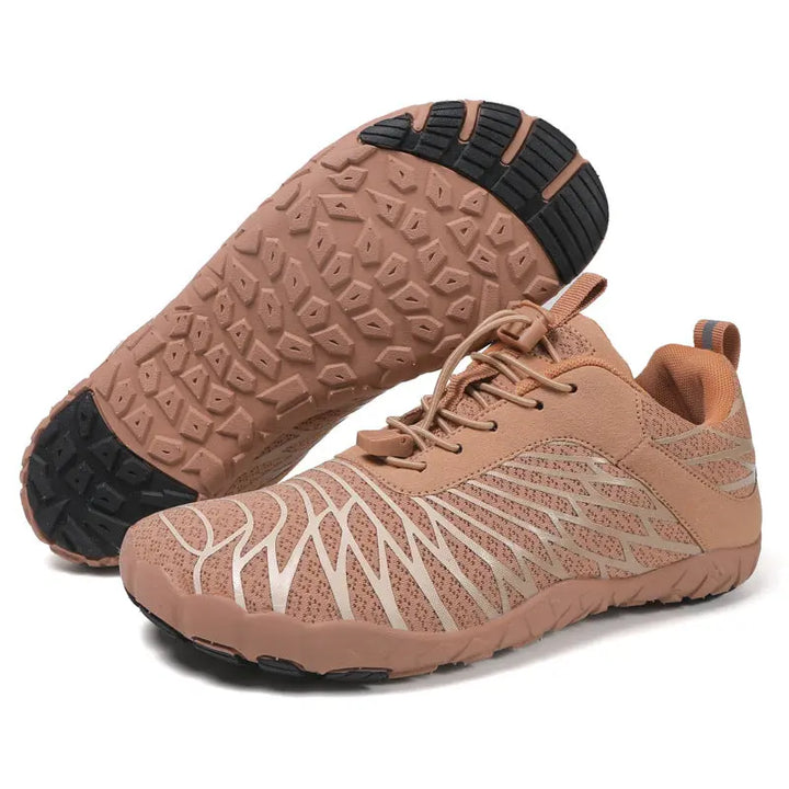 Brown unisex slip-on hiking shoes shown with one outsole raised to show the segmented sole and black traction zones on white.