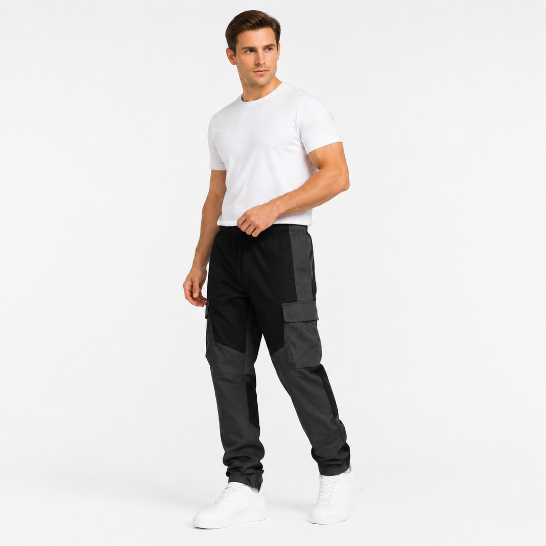 Men's black multi-pocket trousers styled on male model against a clean white background