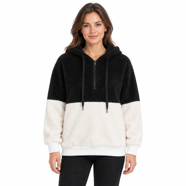 Model wearing the black and ivory women&