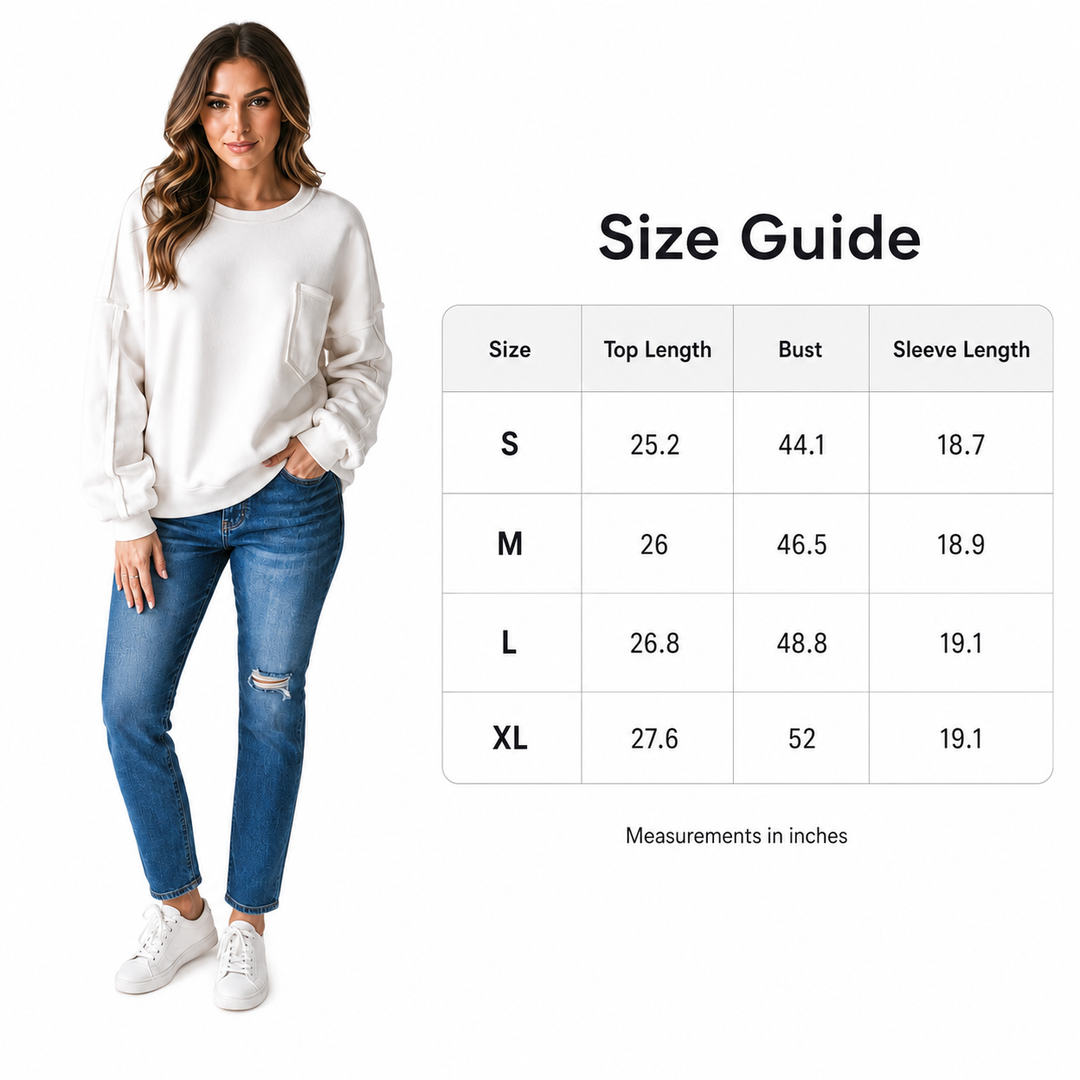 White exposed seam top for women with practical front pockets, relaxed fit and clean everyday wardrobe styling for work days.