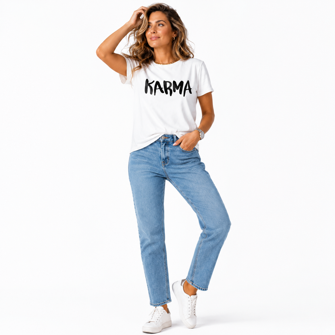White casual graphic T-shirt for women with 3D-effect Karma print, loose pullover style, and denim-ready outfit styling look.