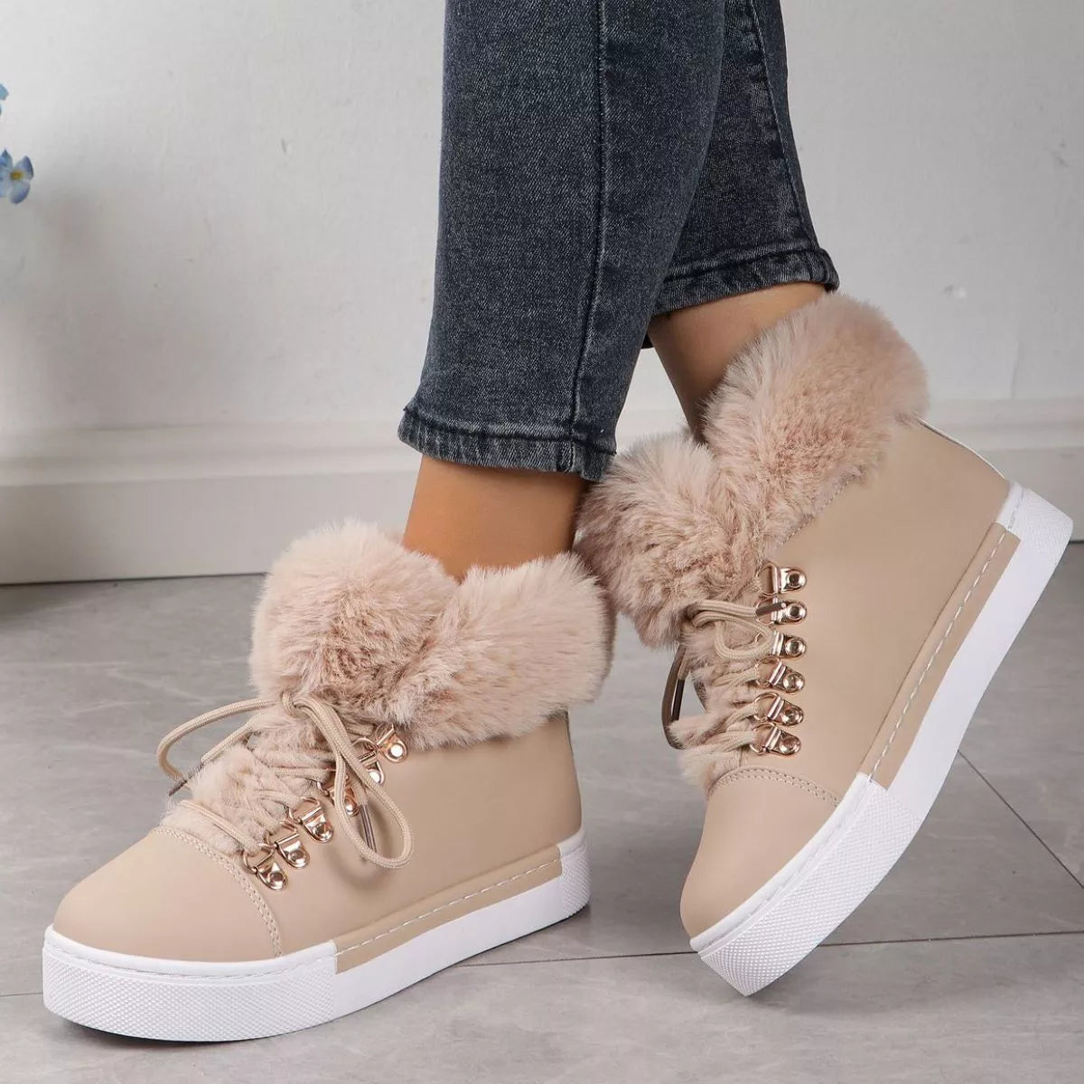 winter suede boots womens low heel lace-up front fuzzy trim collar shown on model feet walking

