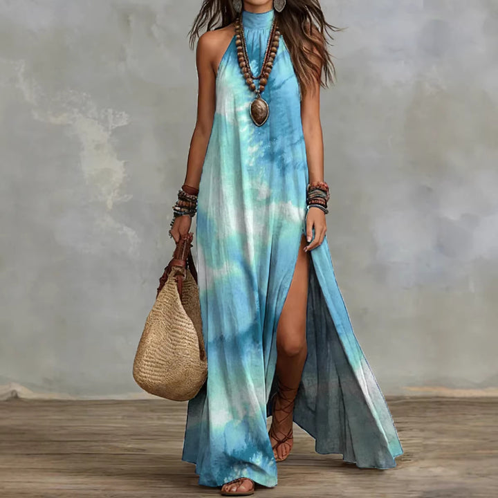 Teal printed summer maxi dress with side slit, loose fit and elegant halter neckline for travel, casual wear and dancing