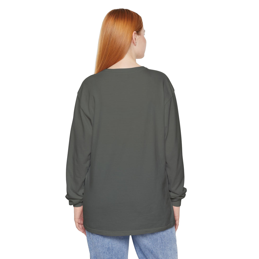 Person wearing a long-sleeve gray shirt on a white background
