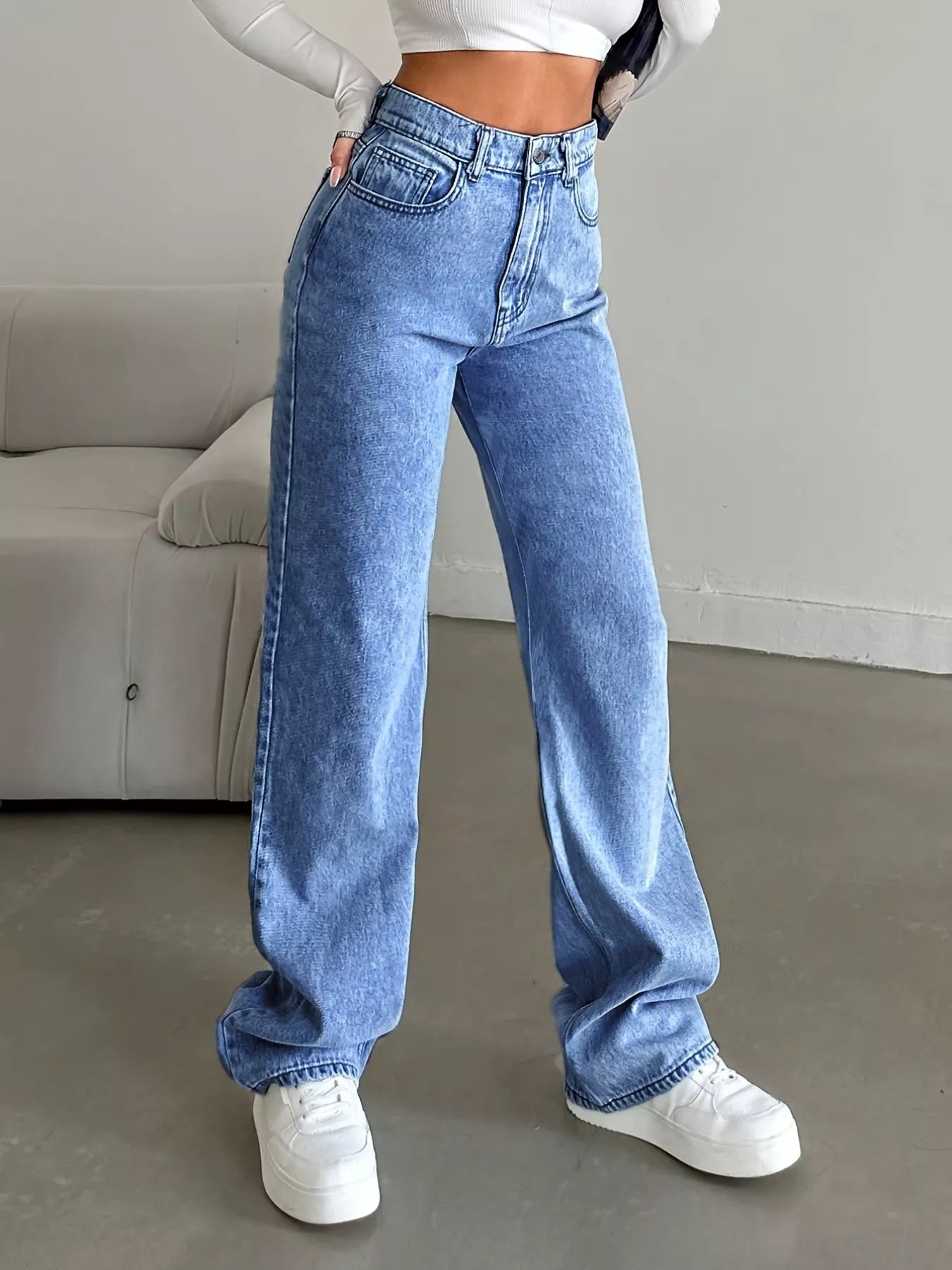 high waisted wide leg jeans waistband and belt loops detail on structured denim for a smooth, flattering fit
