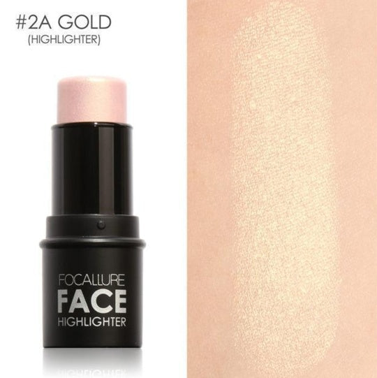 Focallure face highlighter stick with gold color swatch on a white background