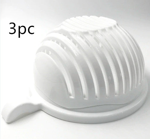 Two salad cutter bowls side by side — small and large sizes compared on a marble countertop