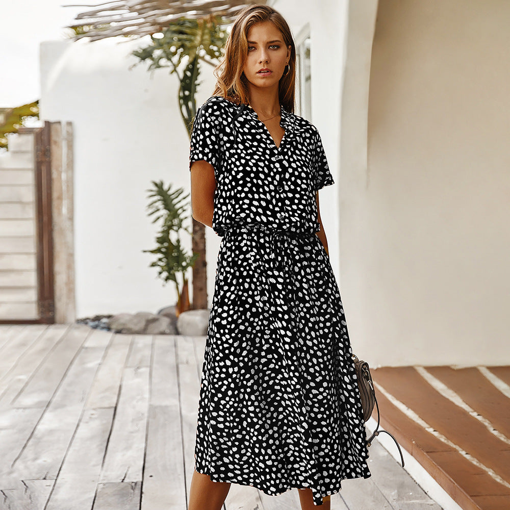 polka dot chiffon dress feminine drape movement walking outdoor scene