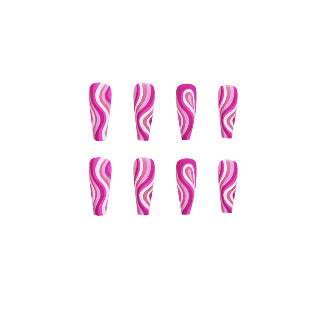 Pink swirl nail tips with bold curved line art, wearable finished false nails for beauty shoots, parties, and daily glam now.