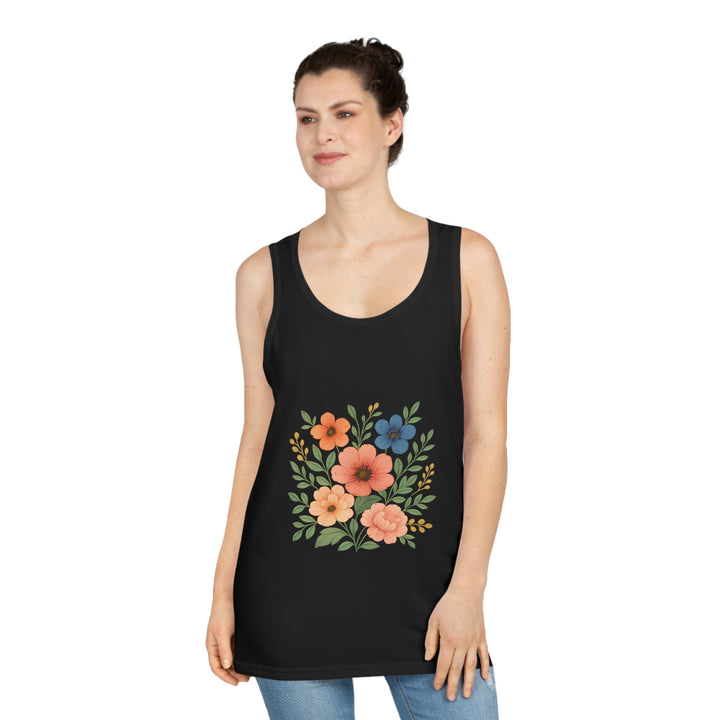Woman wearing a black tank top with floral design on a white background
