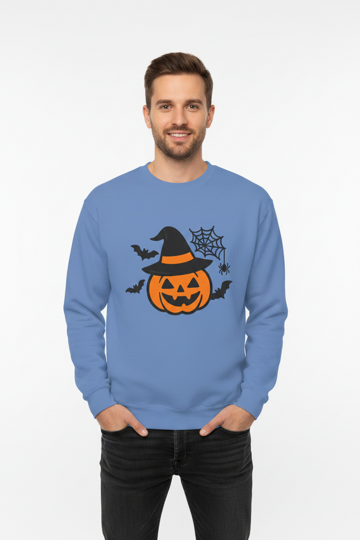 Flat lay of Halloween pumpkin sweatshirt in rust orange on wooden surface with autumn leaves

