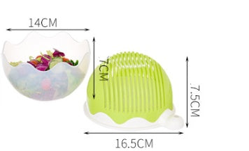 Child-safe vegetable chopper bowl with locked lid shown next to a colorful kids lunch plate