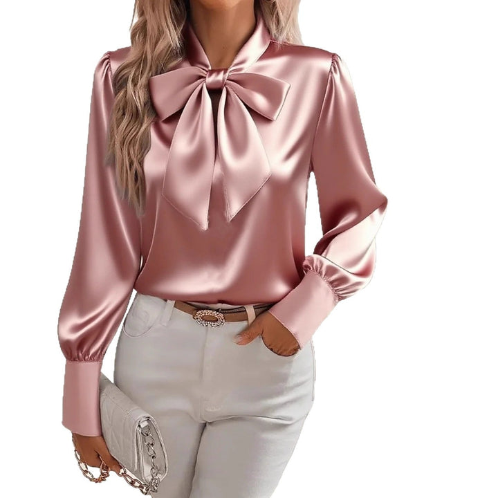 Bow tie blouse with long sleeves styled for a polished office outfit