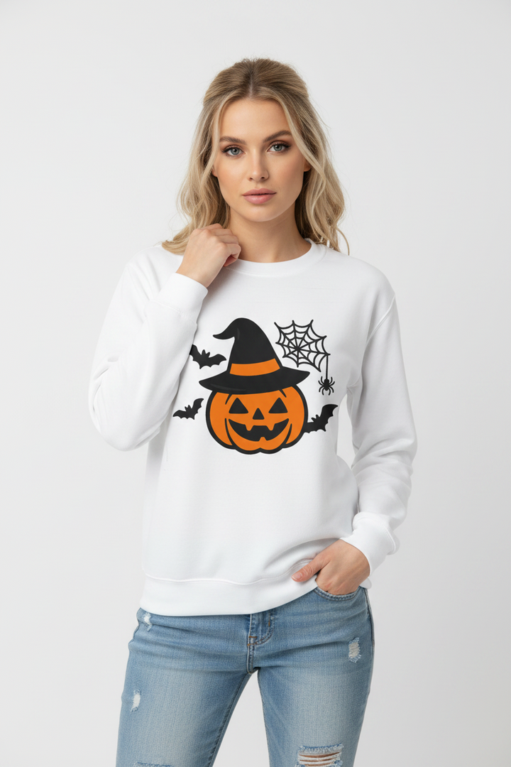 Unisex Halloween pumpkin sweatshirt in orange, relaxed fit, styled on a woman outdoors in autumn
