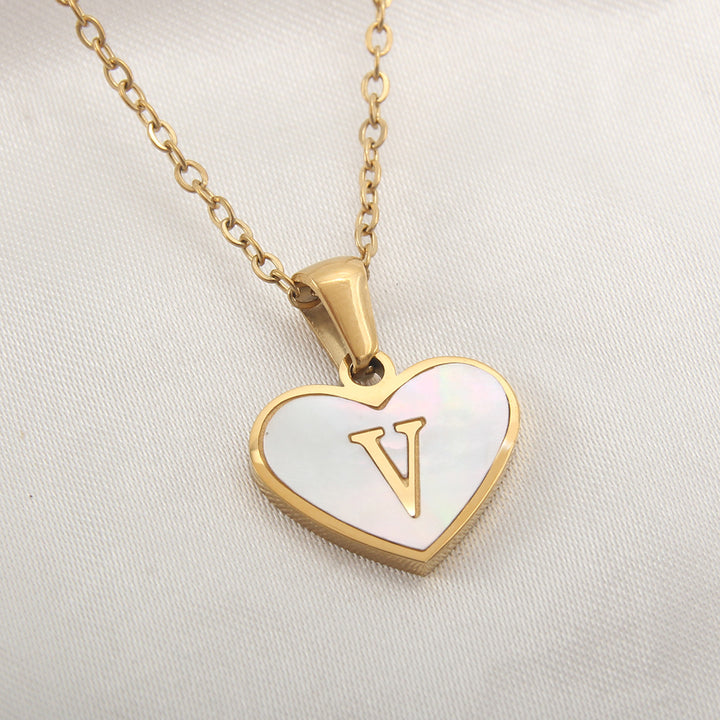 Alphabet letter necklace with heart-shaped pendant, stainless steel material and gold-plated finish - PrintOne1 product view.