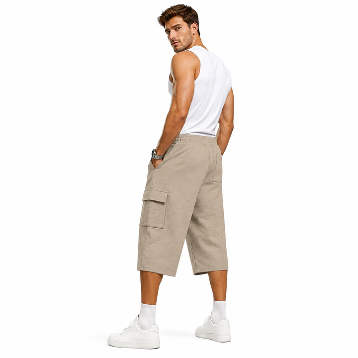 Mens cargo shorts in beige with drawstring waist, cropped length, straight-leg fit and side pocket for summer looks now style