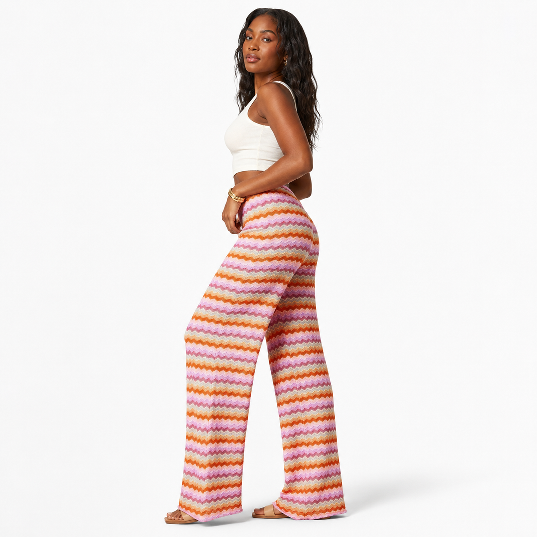 Color block wide leg pants with a full-length silhouette, conventional weight and bold patterned streetwear appeal for women.