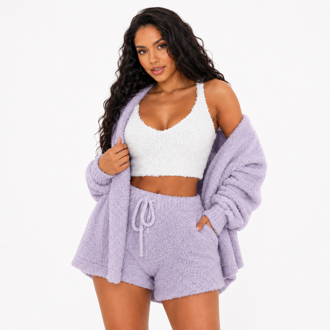 3 piece pajama set women in violet velvet with white crop top, cardigan and drawstring shorts against a clean white backdrop.