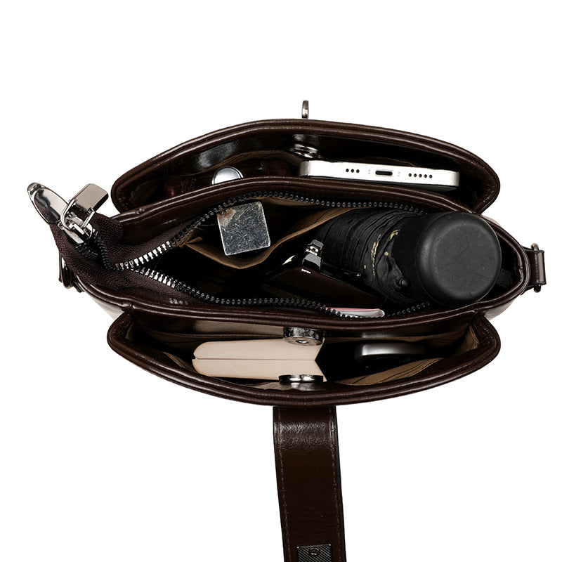 daily messenger bag women with structured form and refined hardware close-up lifestyle view