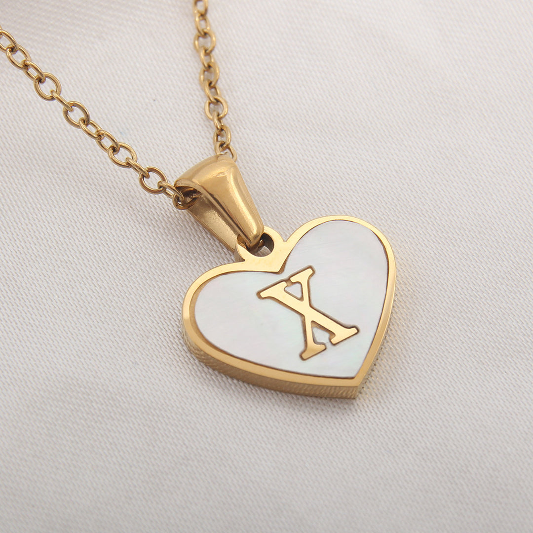 Heart-shaped alphabet necklace with gold-plated finish, stainless steel construction and A to Z options - Buyer product view.