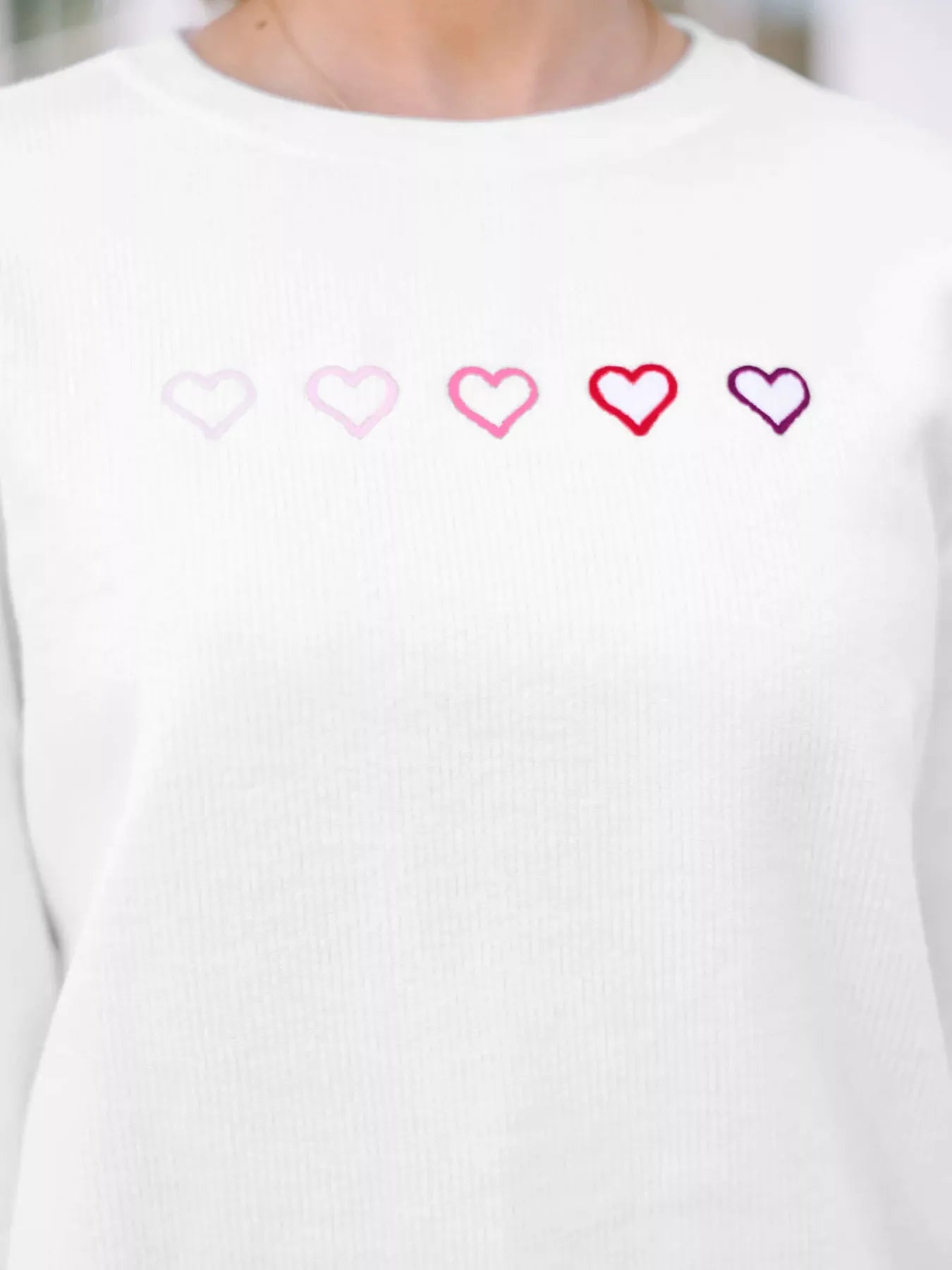 heart embroidered oversized sweatshirt sleeve detail with ribbed cuff and smooth seams for comfortable all-day wear

