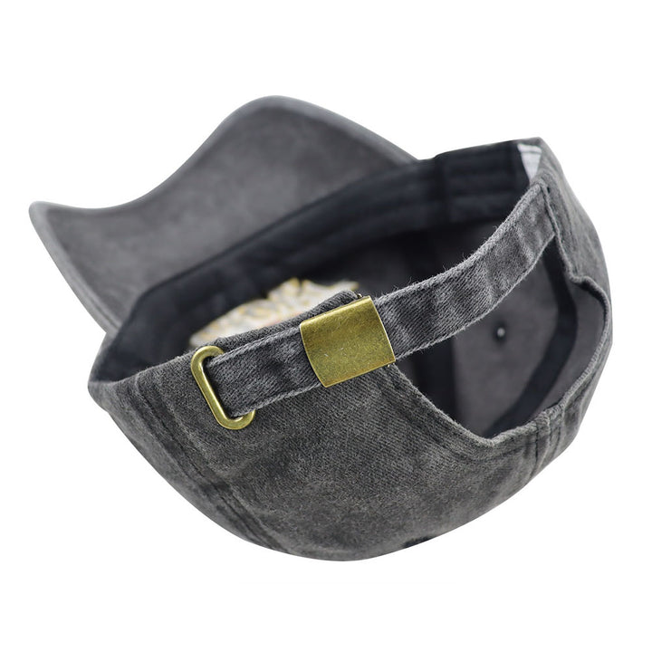 Gray denim cap with a gold buckle on a white background