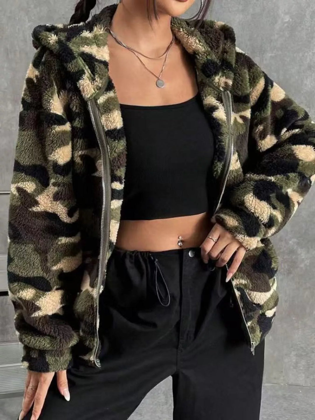 womens camo hoodie zip up fuzzy polyester outerwear piece with relaxed silhouette and practical side pockets