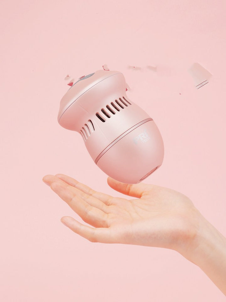 Electric pedicure foot file removing rough heel skin in a bright bathroom setting