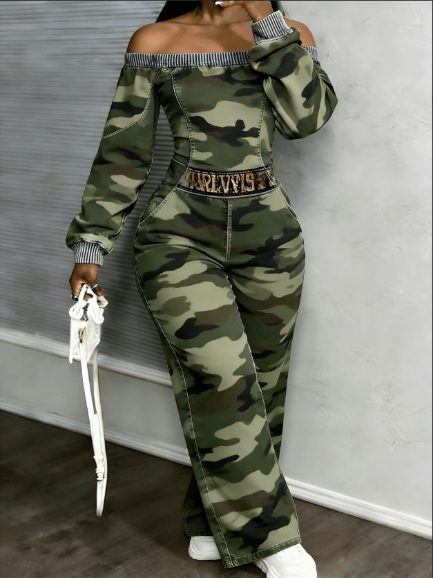 Full-body model shot of camo wide leg jumpsuit with a sharp waist and easy one-piece styling
