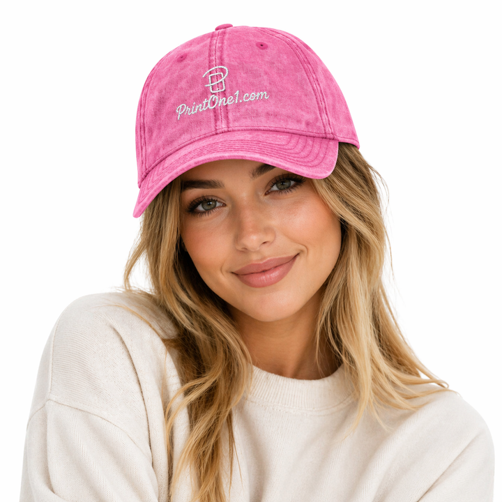 Front view of vintage embroidered cap with structured crown and curved visor on a clean studio background