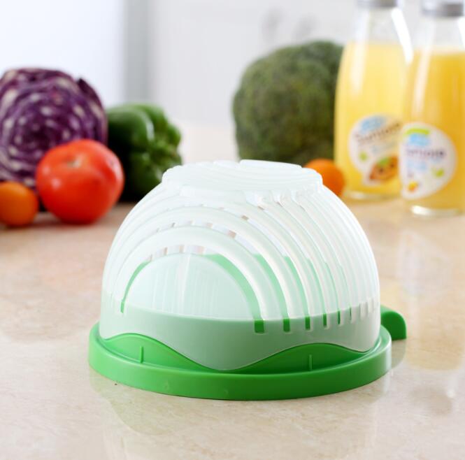 Colorful salad ingredients being chopped with the fruit and vegetable cutter
