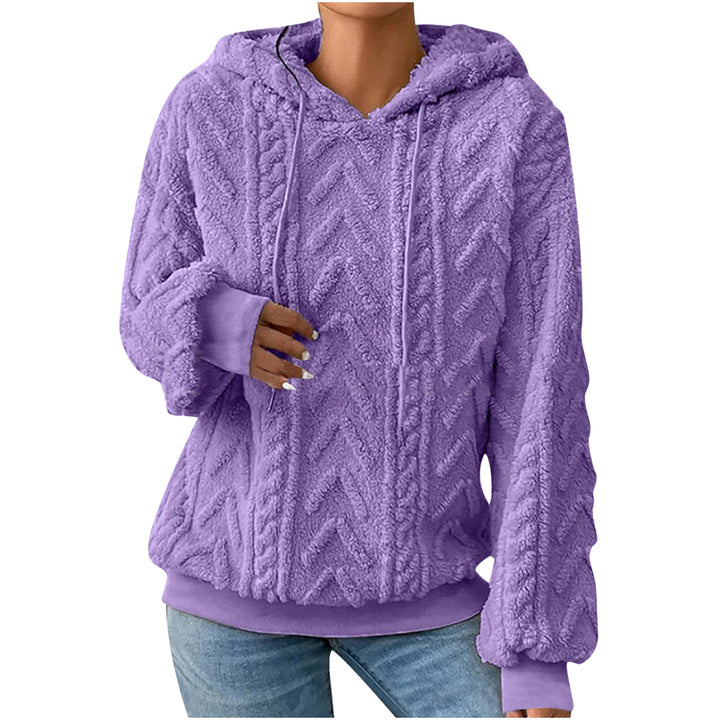 Purple textured hoodie on a model, shown from the front. The textured fabric is pictured in detail in the product photograph.