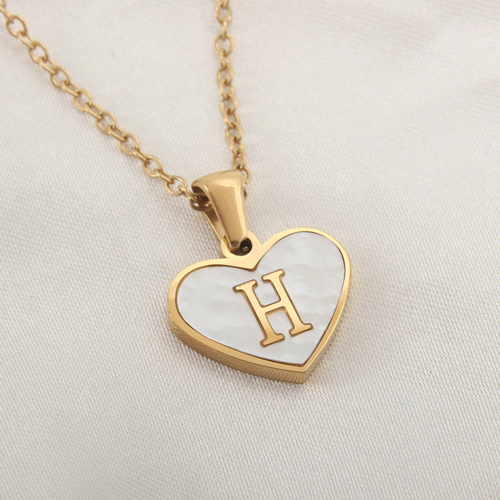 Alphabet heart necklace with gold-plated finish, stainless steel material and selectable letters A through Z - Product image.