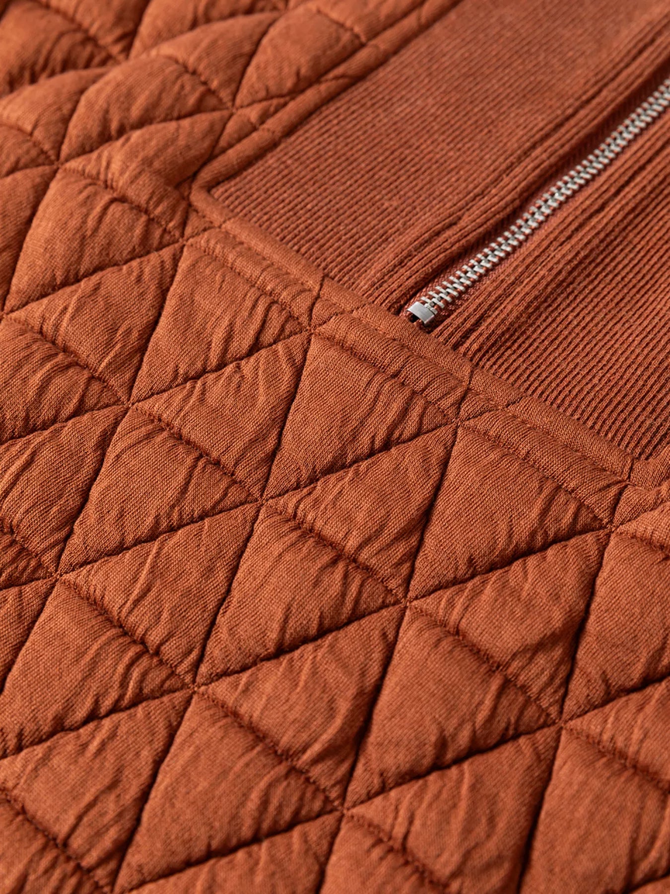  Folded stack geometric quilted half-zip sweatshirts in all colors soft fabric texture