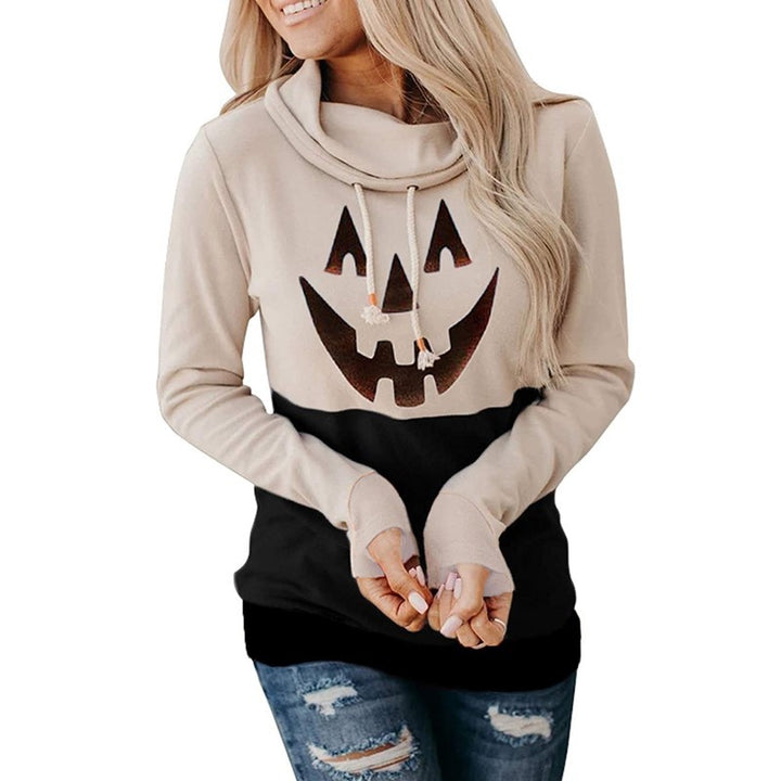 Supplier photo of a beige and black pullover with a pumpkin face graphic, long sleeves and folded collar with two drawstrings