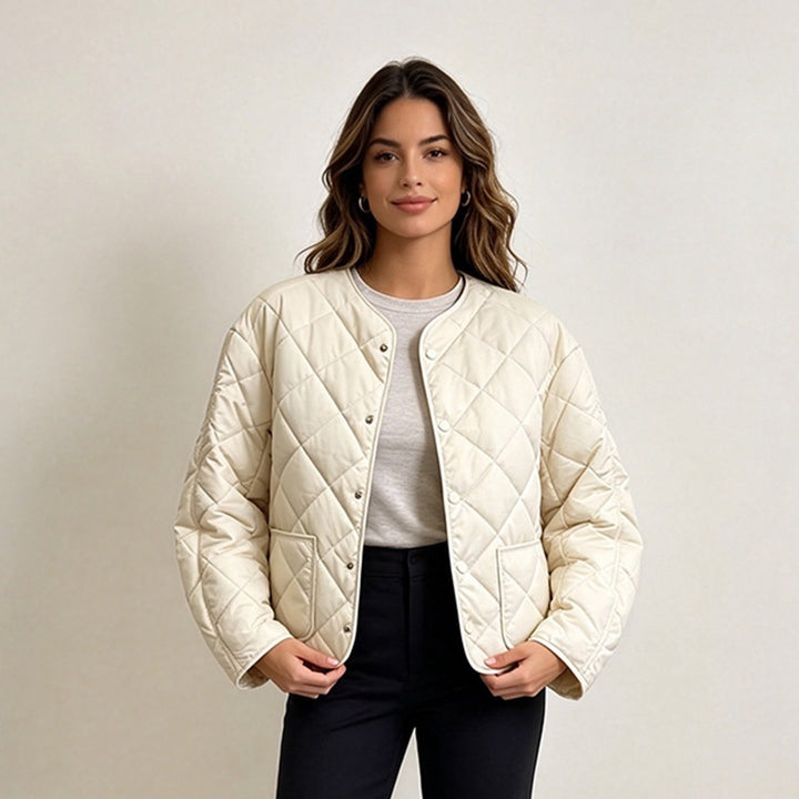 Off-white diamond-quilted jacket shown from the front