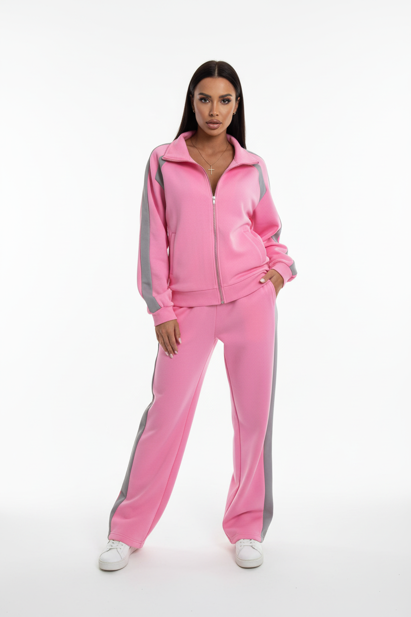 Woman in pink co-ord tracksuit set stretching outdoors, morning workout outfit, soft natural lighting
