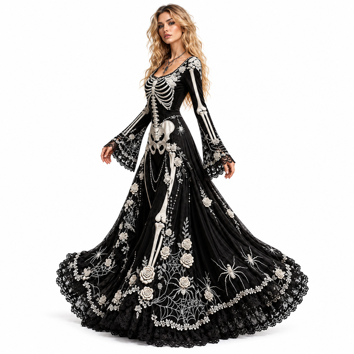 A woman modeling a long black ball gown with white skeleton bone embroidery, floral lace appliqué, spider motifs, and a ruffled hem against a plain white studio background.
